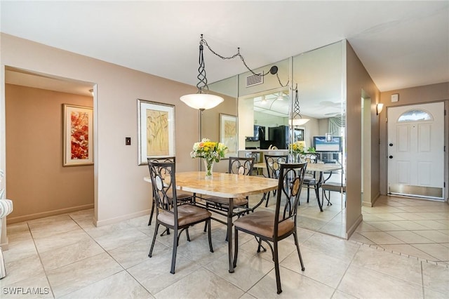 view of tiled dining room