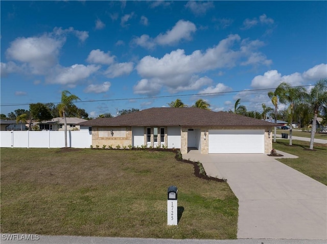 ranch-style house with a garage and a front lawn