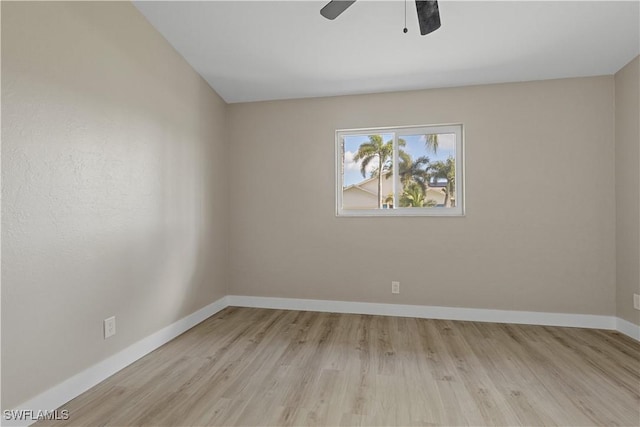 spare room with light wood-type flooring