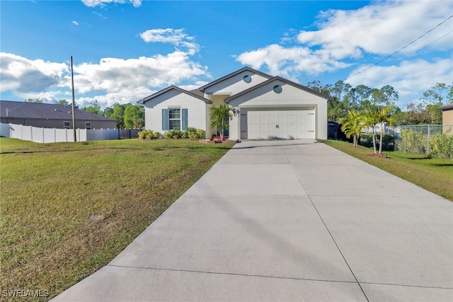 view of front of property featuring a front yard and a garage