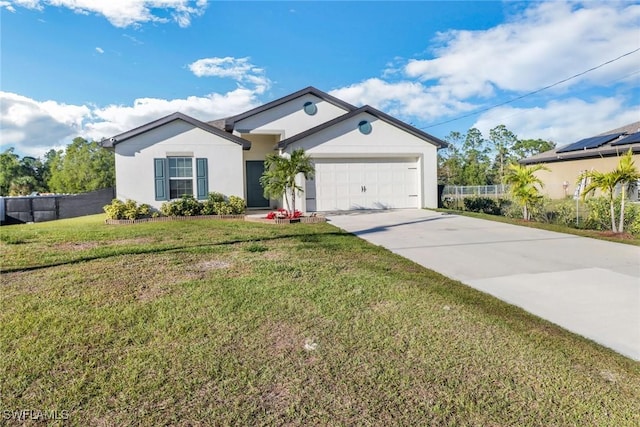 single story home with a garage and a front yard