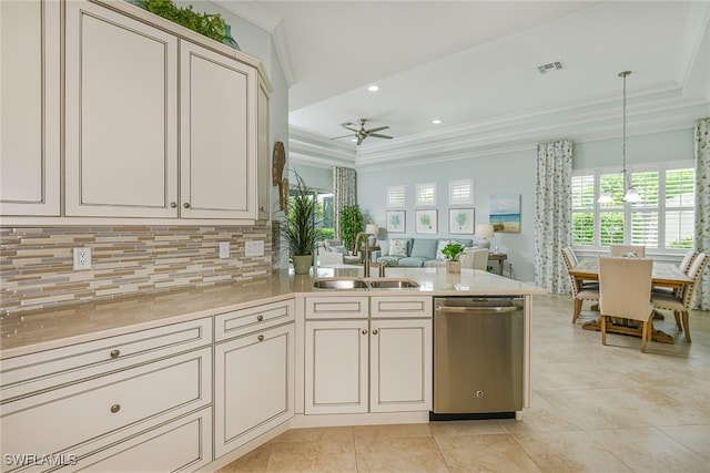 kitchen featuring ceiling fan, sink, stainless steel dishwasher, crown molding, and pendant lighting