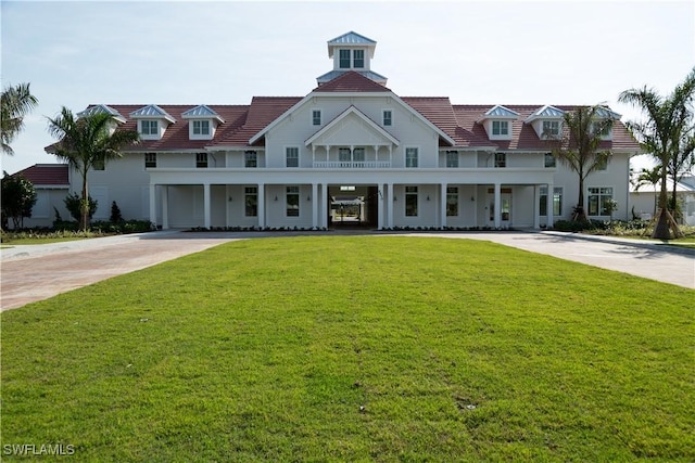 view of front of home featuring a porch and a front yard