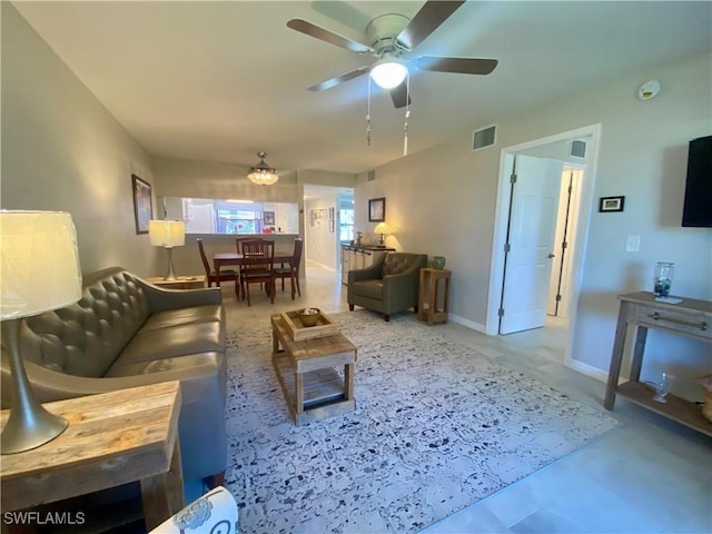 living room with ceiling fan