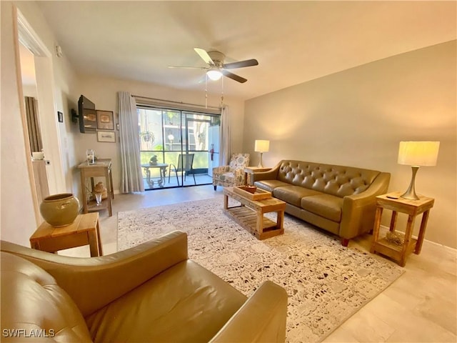 living room with ceiling fan