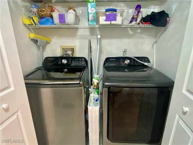 laundry room featuring separate washer and dryer