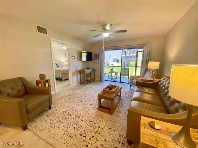 living room with ceiling fan