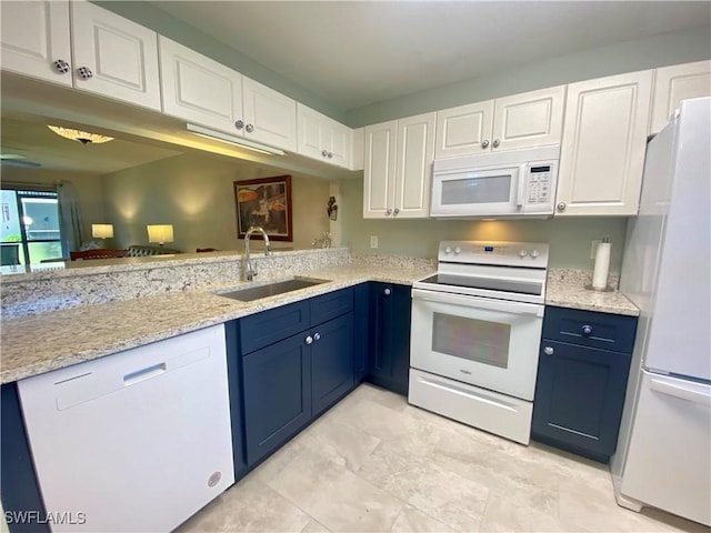 kitchen featuring white cabinetry, white appliances, blue cabinets, and sink