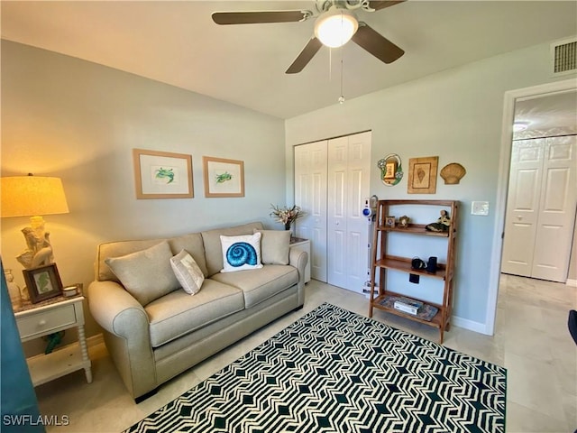 living room with ceiling fan