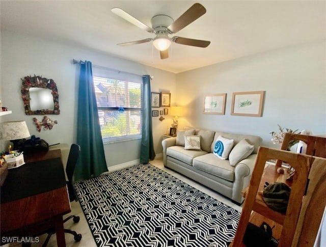 carpeted living room featuring ceiling fan