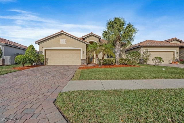 view of front facade featuring a front lawn and a garage