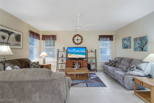 living room with light tile patterned floors and ceiling fan