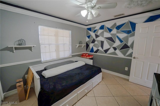 bedroom featuring ceiling fan, light tile patterned flooring, and crown molding