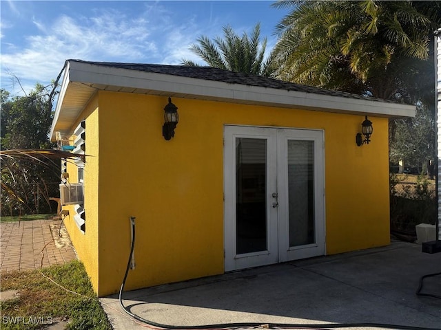 view of outbuilding with french doors