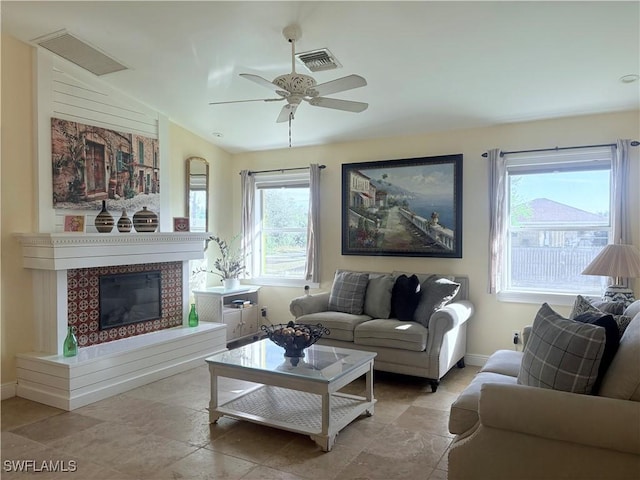 living room with vaulted ceiling and ceiling fan