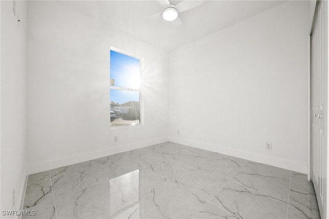 unfurnished room featuring ceiling fan