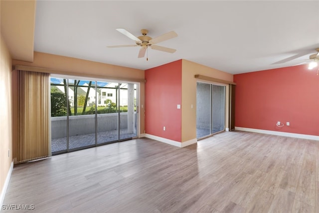 unfurnished room featuring ceiling fan and light hardwood / wood-style floors