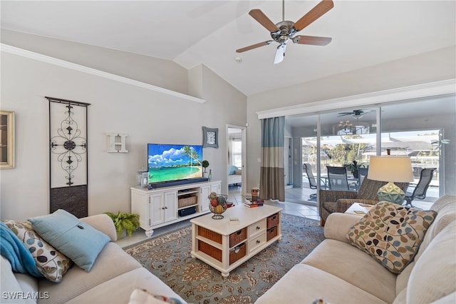 living room with tile patterned flooring and vaulted ceiling