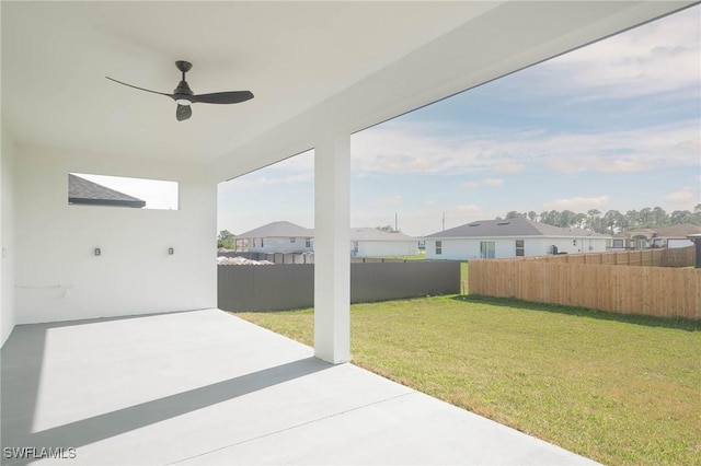 view of patio featuring ceiling fan