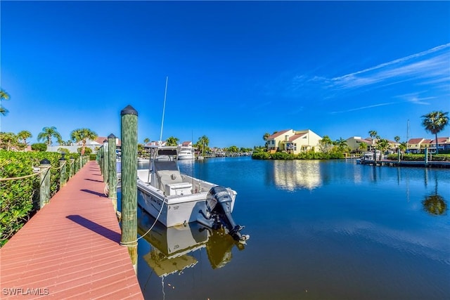 dock area featuring a water view