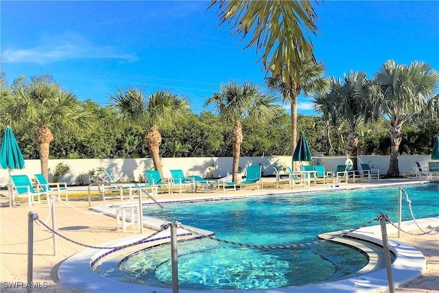 view of swimming pool with a patio area