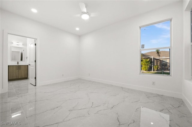 empty room featuring ceiling fan