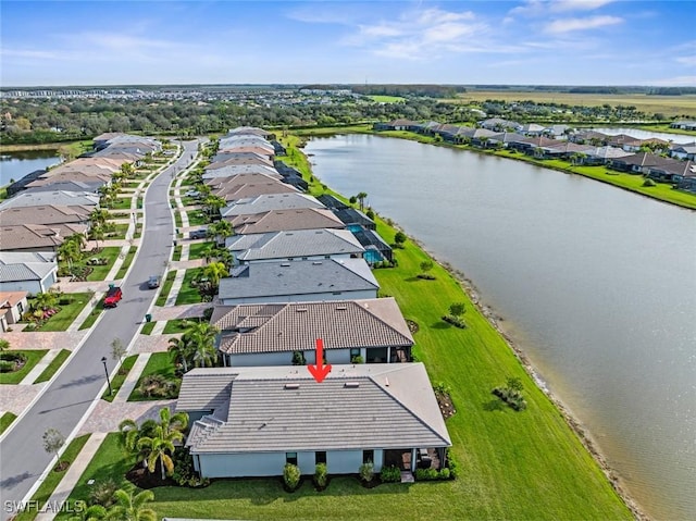 drone / aerial view featuring a water view