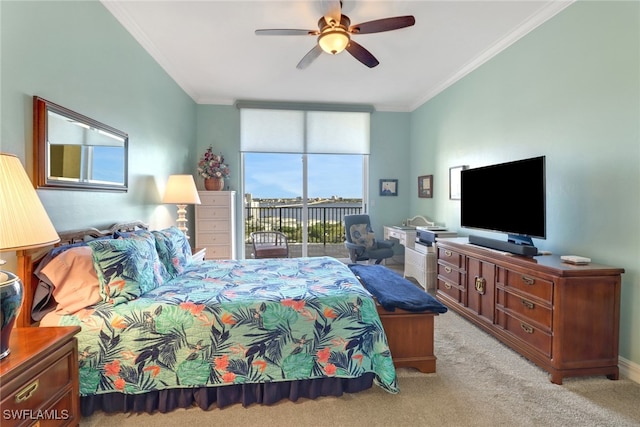 carpeted bedroom with access to outside, ornamental molding, and ceiling fan