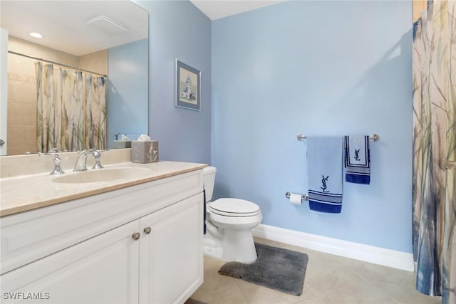 bathroom featuring vanity, curtained shower, tile patterned floors, and toilet