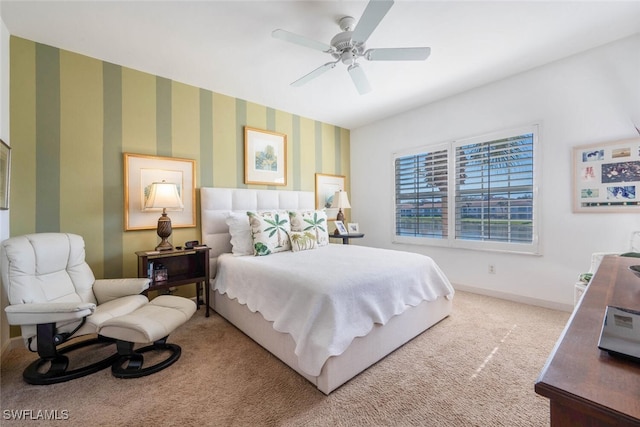 carpeted bedroom featuring ceiling fan, baseboards, and wallpapered walls