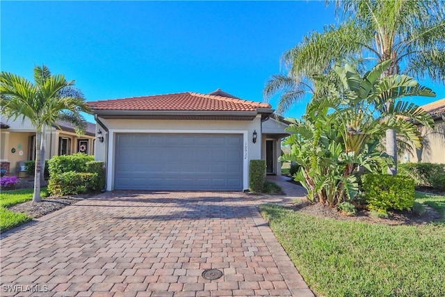 view of front of home with a garage