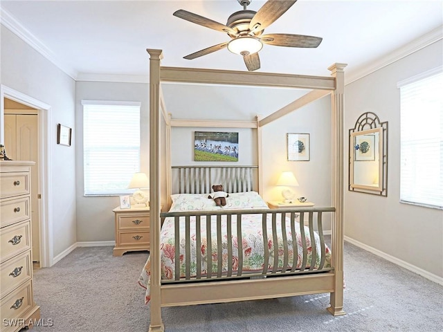 bedroom with multiple windows, ceiling fan, and crown molding