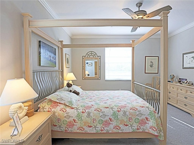 carpeted bedroom featuring ceiling fan and ornamental molding