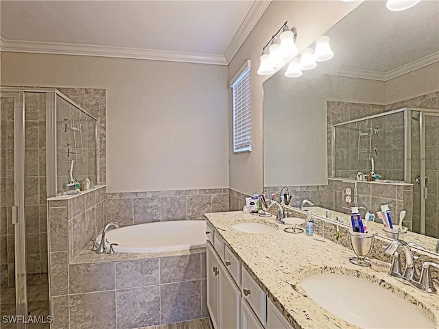 bathroom with vanity, shower with separate bathtub, and crown molding