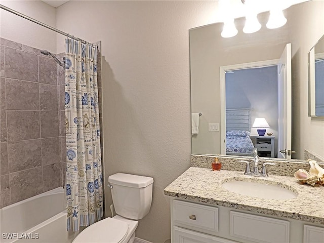 full bathroom featuring shower / bath combo, toilet, and vanity