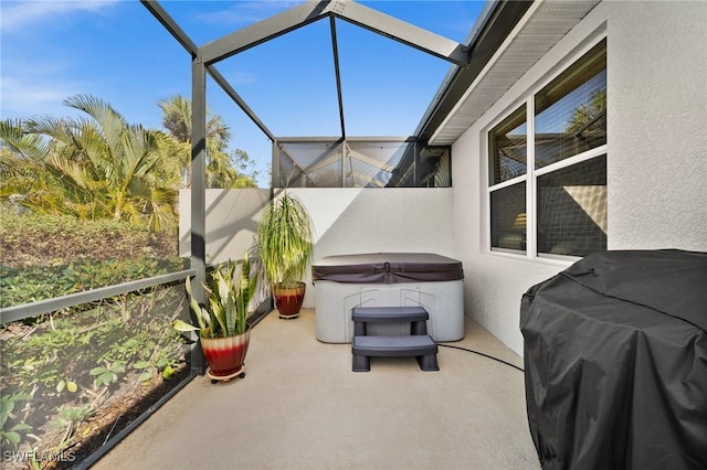 view of patio / terrace featuring a hot tub