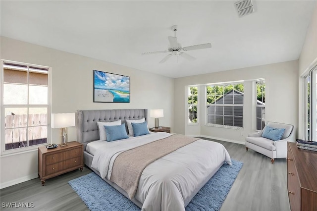 bedroom featuring ceiling fan and light wood-type flooring