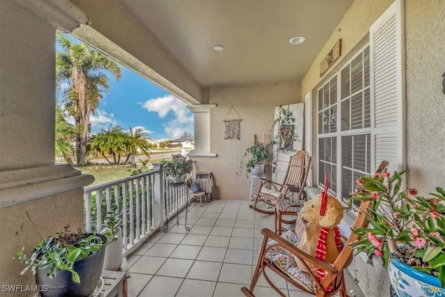 balcony featuring a porch