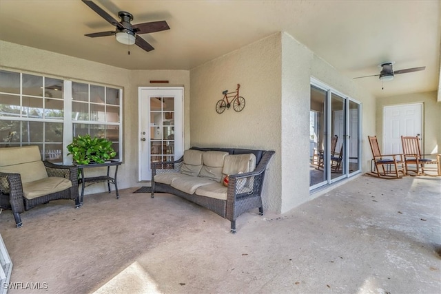 view of patio / terrace featuring ceiling fan