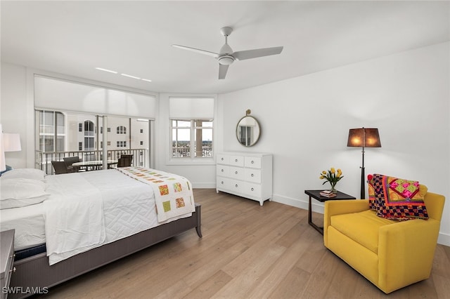 bedroom featuring ceiling fan and light wood-type flooring