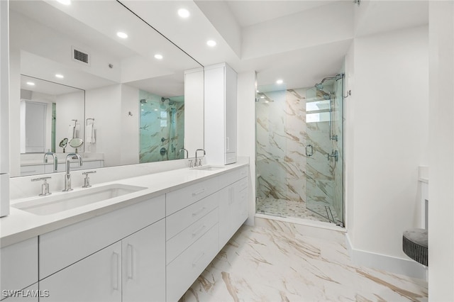 bathroom with vanity and walk in shower