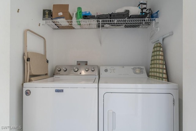 laundry area featuring washer and clothes dryer