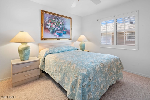 bedroom featuring ceiling fan and carpet floors