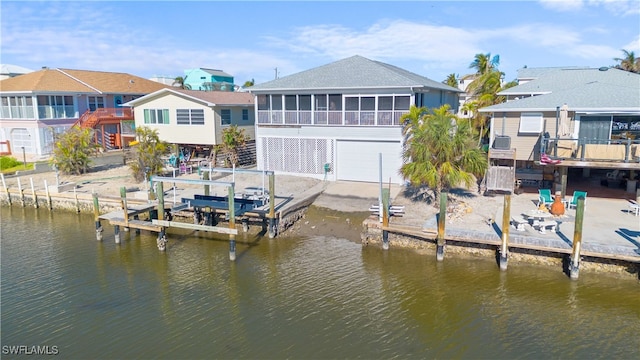 dock area with a water view