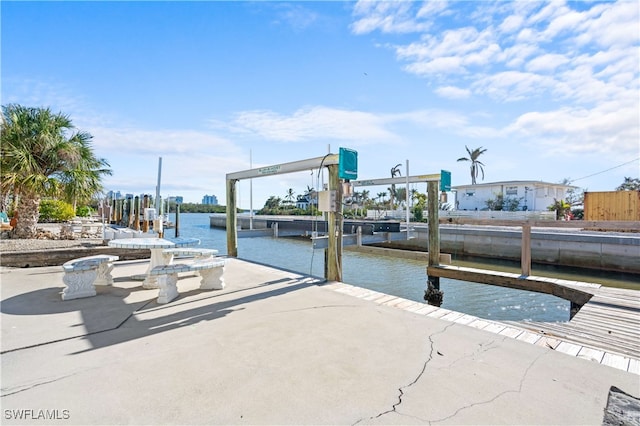 view of dock with a water view