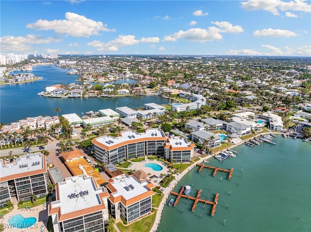 drone / aerial view with a water view