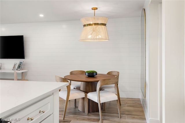 dining room with light hardwood / wood-style flooring