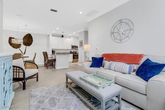 living room featuring sink