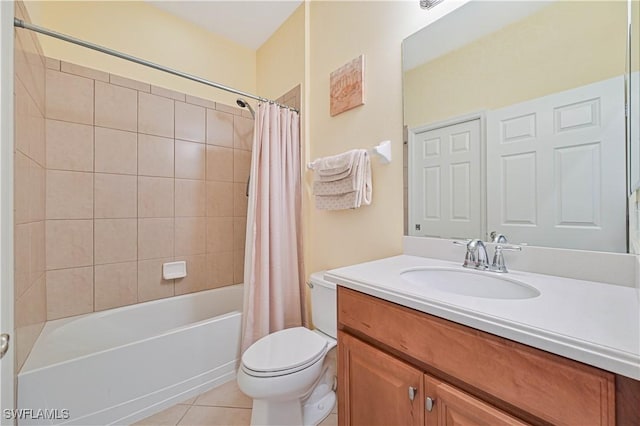 full bathroom with shower / bath combo with shower curtain, tile patterned flooring, vanity, and toilet