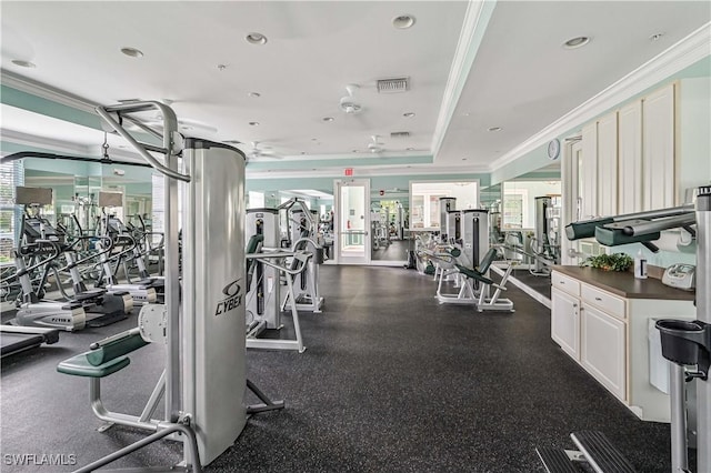 exercise room with ornamental molding